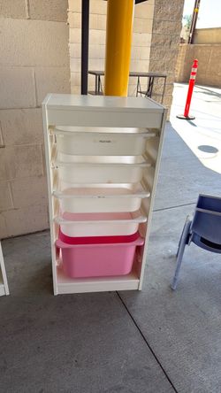 Kids storage shelf with plastic bins