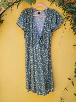 Green and white floral tie dress with ruffle sleevw
