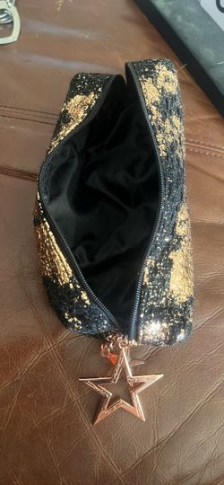 Makeup bag with hair pins