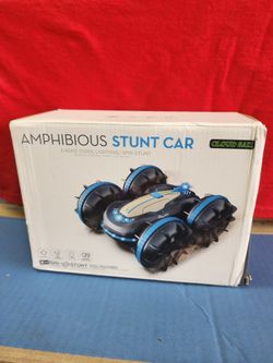 Stunt Car is a 2.4GHz 4WD remote-controlled toy designed to drive on both land and water with 360-degree spinning capabilitie