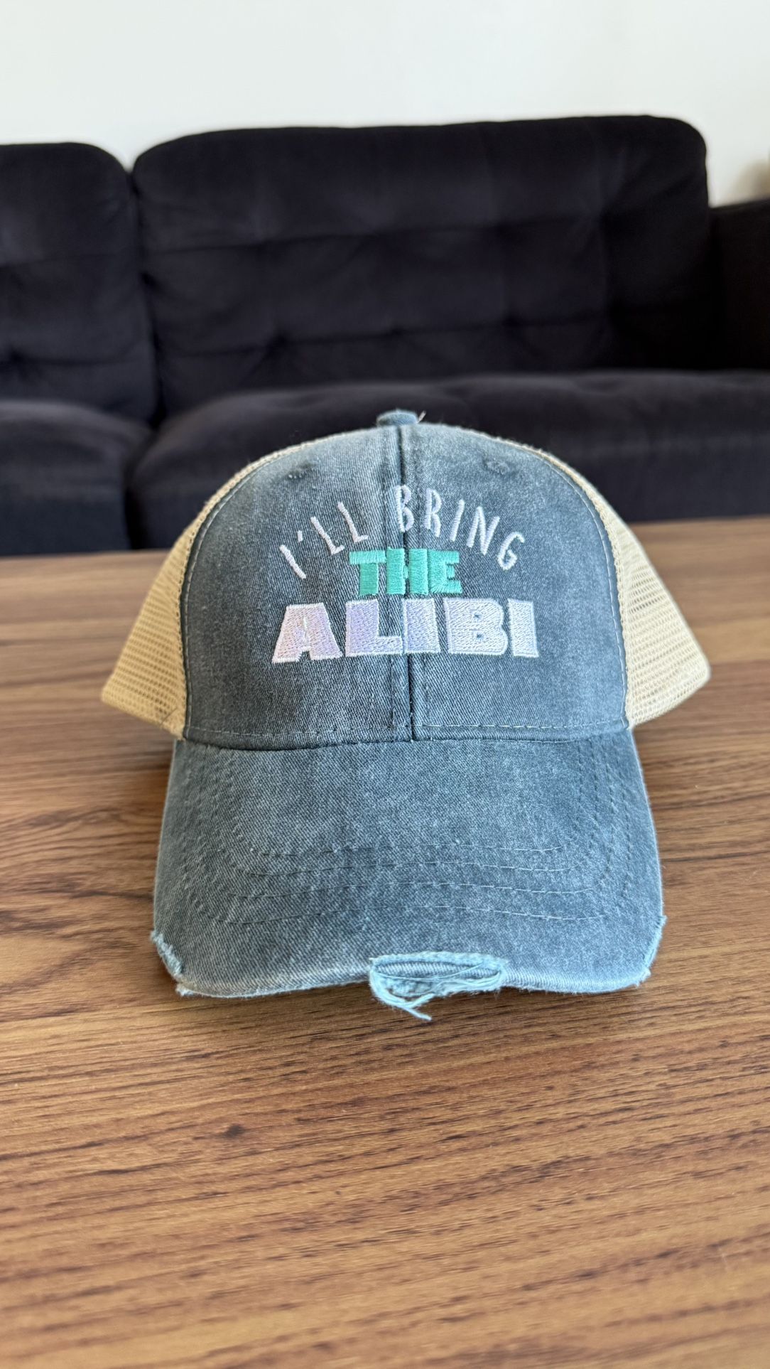 “I’ll Bring the Alibi” Vintage Trucker Hat by Adams – Distressed Mesh Snapback**