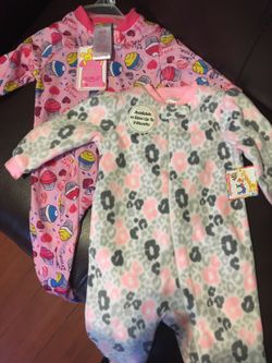 Baby girl sleepers 3-6 and 6-9 months. Brand new