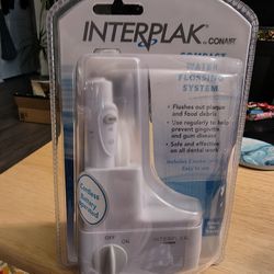 New Interplak Cordless Dental Flossing System