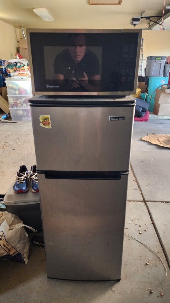 Small Refrigerator / Freezer And Microwave.