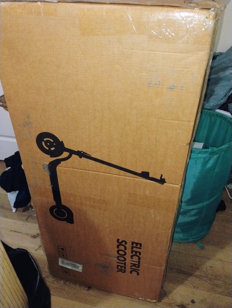Brand New Electric Scooter  In Box