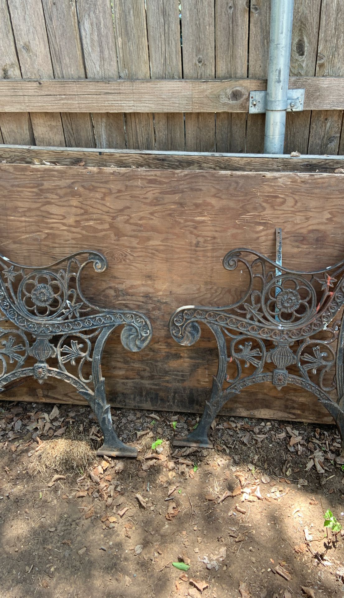 Heavy iron antique bench ends