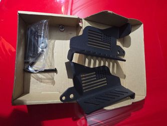 This 1-pair set of Black Steel Front Foot Pegs with US Flag Design (for 1997–2006 Jeep Wrangler
