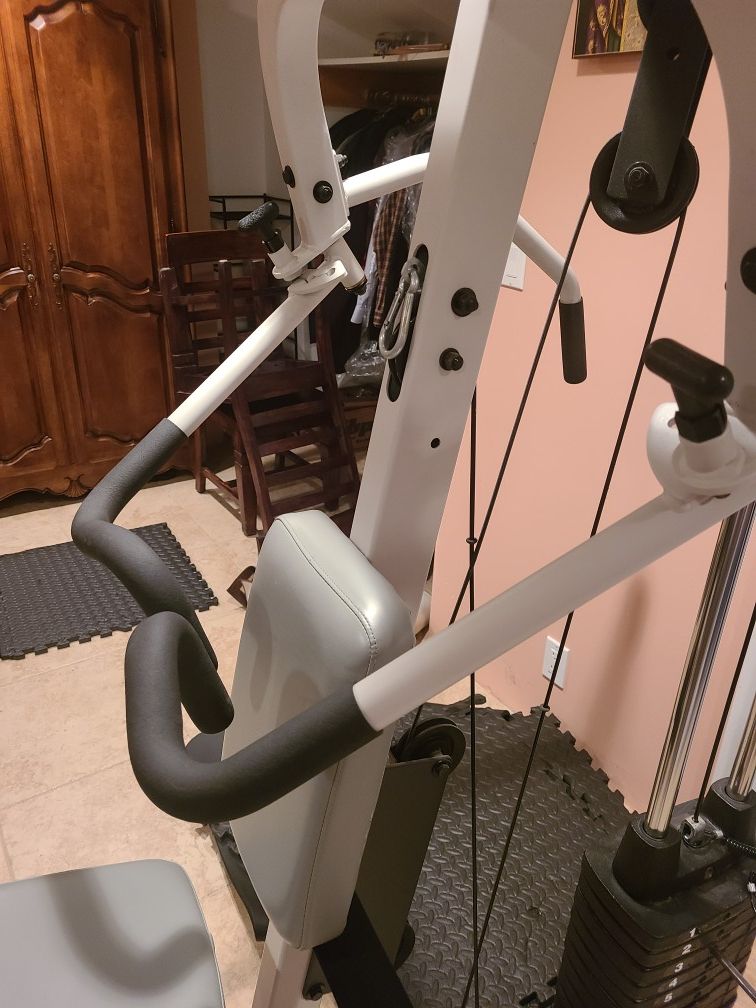 Precor Zuma Home Gym 200 pounds in weight with increments of 10. Lat