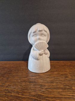 Collectible Benihana Sakura Girl Tiki Mug made of white ceramic.