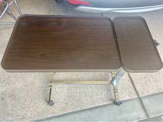 Adjustable bedside table