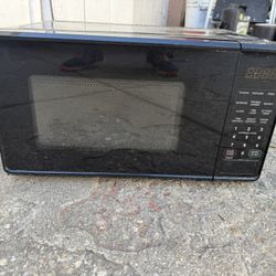 Small Microwave In Excellent Condition  18” Wide  12” Side  9” High  