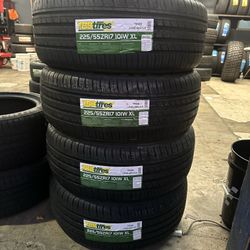 FOUR NEW TIRES WITH FREE ALIGNMENT 