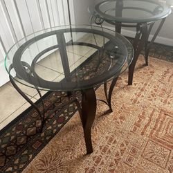 2 Glass round Table $100