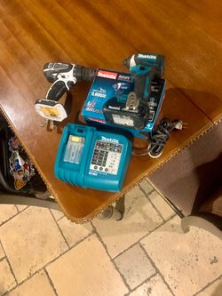 Makita Impact Driver with Charger and Drill