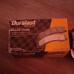 Front and rear brake pads for a Ford expedition