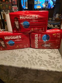 Huggy's little snugglers, diapers.
2 size 1 and 1 size 2