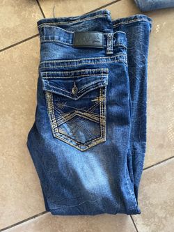Dark blue jeans with brown stitching (size 36/32