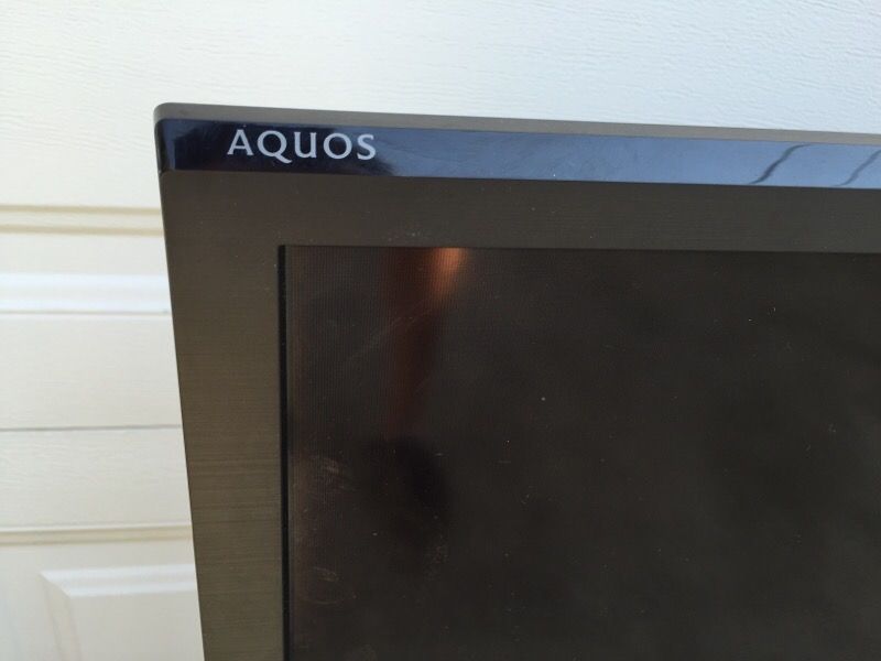 60" Sharp Aquos 1080p Smart TV w/Netflix, Blue Ray DVD, and Surround sound speakers