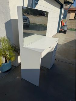 white vanity with multiple drawers