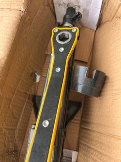Car jack with wrench