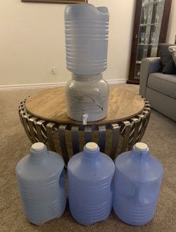 VERY CLEAN WATER CERAMIC CROCK WITH (FOUR 3-Gallon Water bottles)