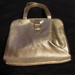 New gold toiletry/makeup bag that snaps closed