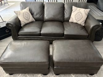 Two Leather Sofas Two Ottomans 4 Pillows