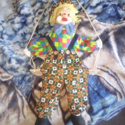 VINTAGE CLOWN DOLL WITH PORCELAIN FACE ON SWING GREEN PLAID SOFT BODY MARIONETTE

