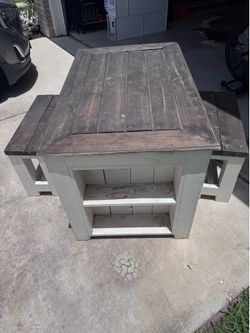 Outdoor patio table and bench seats