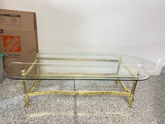 48 L x 28 W x15 H     Glass Coffee table.