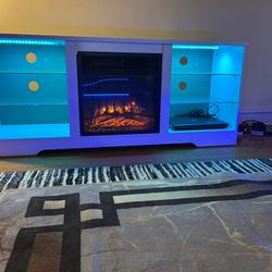 Beautiful Iconic 3-Sided Electric Fireplace TV Stand for TVs up to 75 For $250