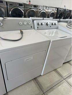 Kenmore top load washer and electric dryer set