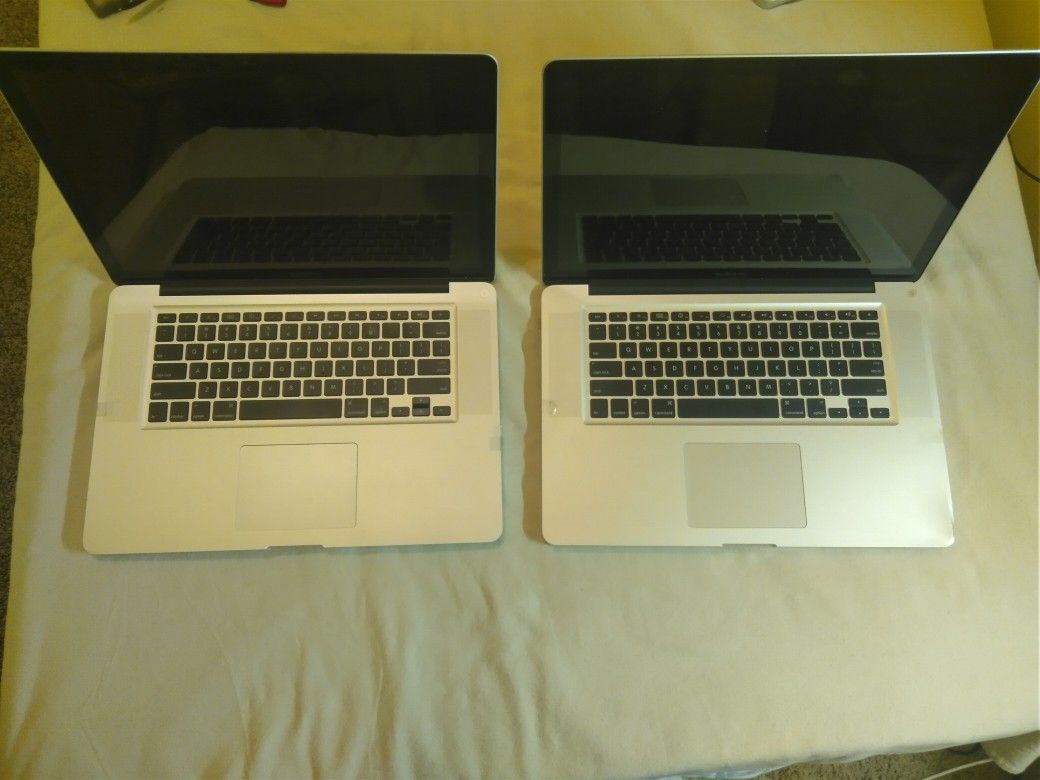 2 MacBook Pros A1286 i7 2010/2011 4gb For Repair All Need Hard Drives And Os