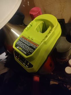 Ryobi air strike nail gun, Ryobi hand saw, interchangable  battery And charger