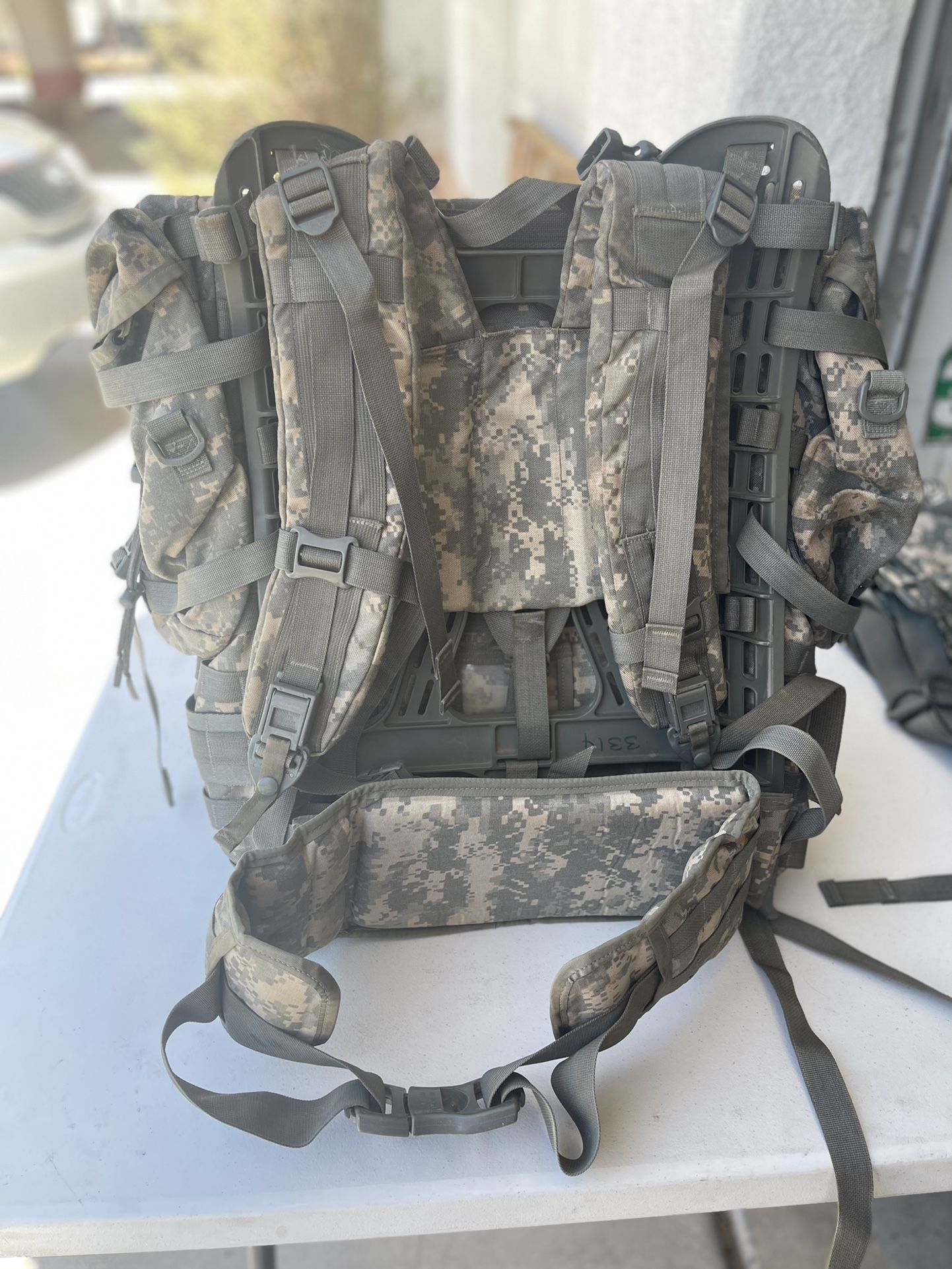 Used USGI MOLLE ACU Field Rucksack Large Complete with Frame and Subsistence Pouches. Complete System NSN: (8465 01 52 36276)