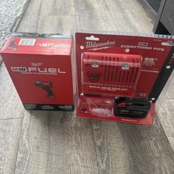 Milwaukee 1/2 in impact wrench with battery and charger