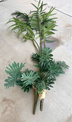 Unassembled artificial faux plant.