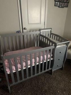crib with storage drawers