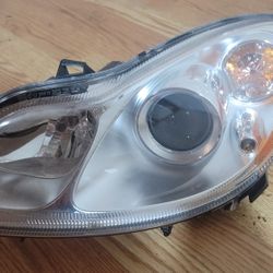 Pair of Headlights off a SmartCar