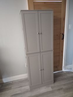 Brand new wood Ashley pantry style organizer. Built.