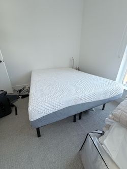 Barely used full size mattress + foldable metal bed frame, great condition — $150