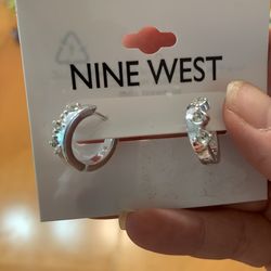 Nine West Earrings brand new Silver hoop earrings with crystal accents. Coral Springs 33071