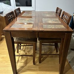 Dining table (w/ built-in leaf) + chairs
