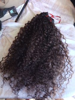 Dark brown curly extensions