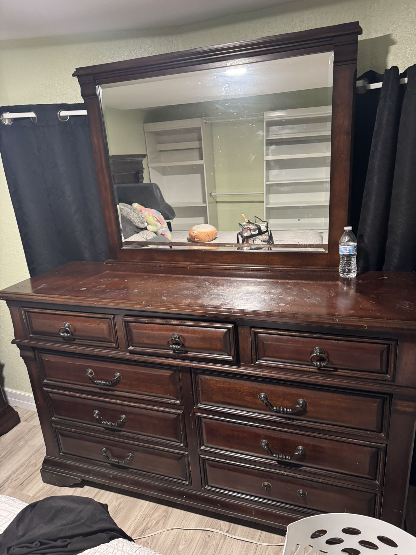 Selling bedroom set — includes bed frame, dresser with mirror, and nightstand. All for $400. Great used condition, ready to go!