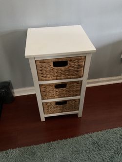 White wood and wicker stand