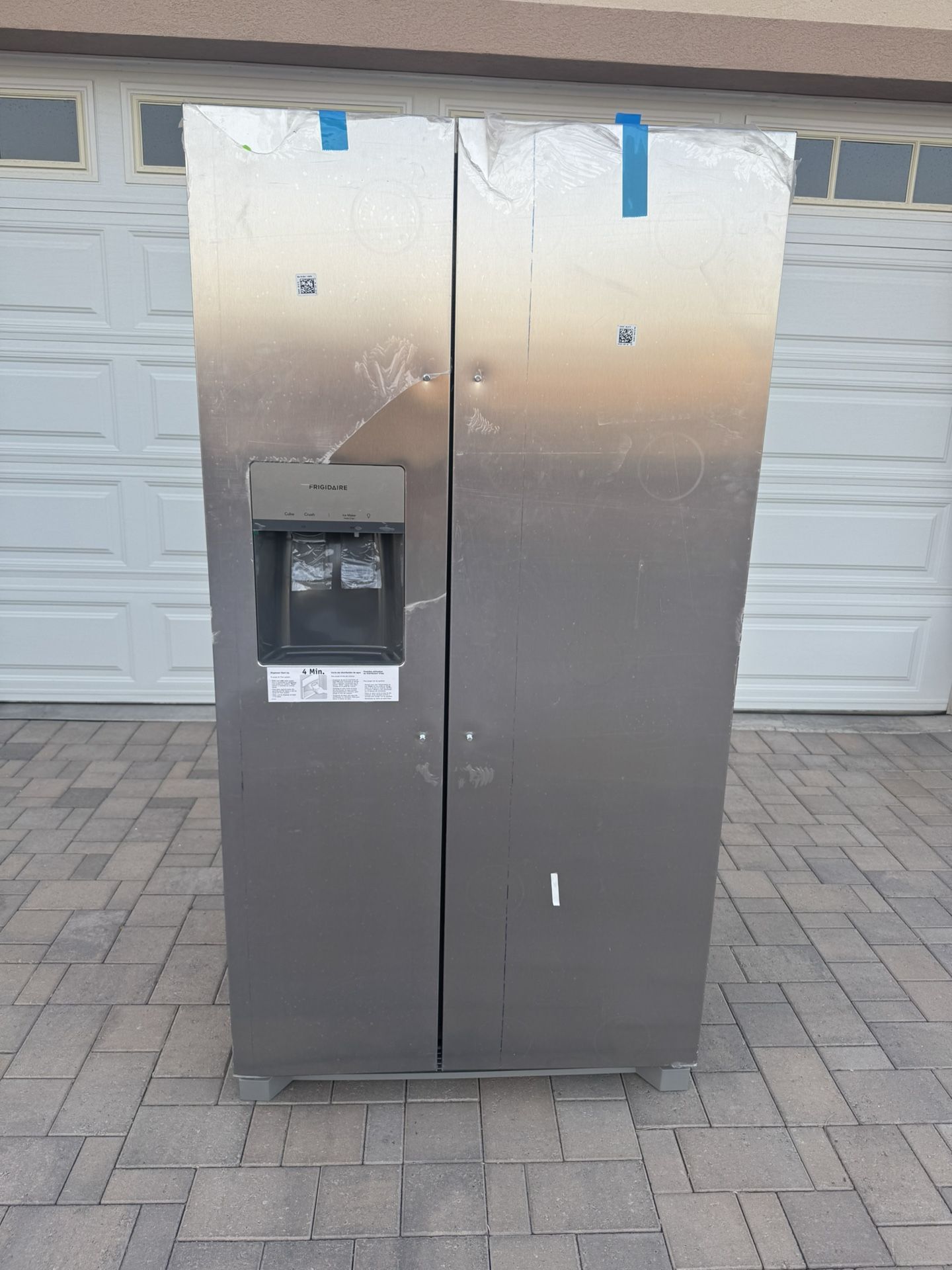 New! Never Used! Frigidaire 36.1 in. 22.3 cu. ft. Counter Depth Side-by-Side Refrigerator in Stainless Steel.