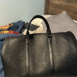 Black Louis Vuitton Monogram Duffel Bag