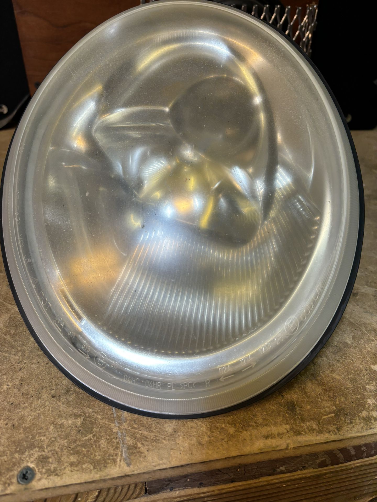 VW Beetle headlight assembly with bulbs