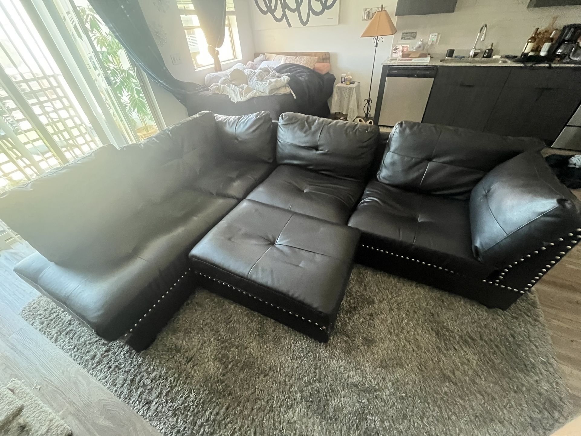 Black Leather Studded Sectional Couch